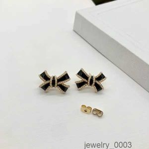 Designer earrings for women classic small fragrant wind Lovely and sweet new 18k gold light luxury flash Black white CHG23120812-6 flybirdlu 6CFK