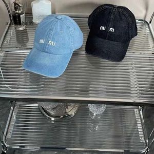 miui miui baseball cap designer hatt vatten tvätt denim blå baseball med böjd randen solskyddsmedel mångsidig utgåva använt mössa för män och kvinnor svart