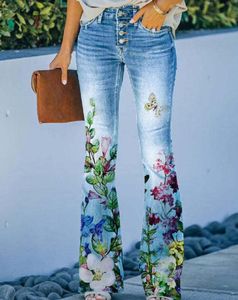 Calças de sino casuais elegantes femininas europeias e americanas de tamanho grande, jeans femininos com padrão floral artístico