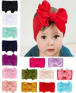 Pure Color Bow Child pannband nylonstrumpor mjuk och bekväm tyg konst hårband mode barn bow knut pannband t9i002543502255