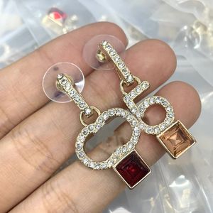 Märke enkla kvinnor lyxdesigner stud kristall strass 18k guld pläterad metall bokstäver örhängen för flickor älskare smycken gåvor grossist kx24i