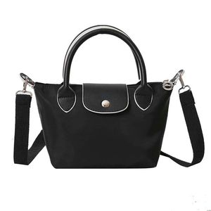 Luxury Designer Bag Womens Shopping Bag axelväska Bästa gåva Tygväska Högkvalitativ mode Casual Bag Mamma Bag stor kapacitet Tygväska 002