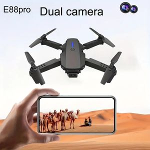 Venda quente Modelo E88Pro Drone Câmera HD Lente de ângulo ajustável de 90 ° Fluxo óptico Altura fixa pairando Fotografia aérea de quatro eixos Aeronave suporta conexão WiFi