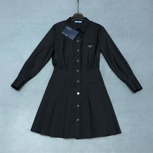 Women's casual dress designer basic classic lapel black dresses early spring long sleeved single row letter button pleated skirt