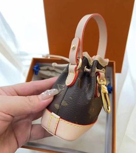 Ciondolo di design marrone classico logo stampato ciondolo borsa a secchiello piccola borsa per gioielli borsa per rossetto portachiavi portatile con confezione regalo