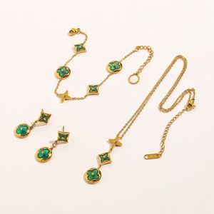 Lyxdesigner kvinnor grönt fyra bladblommor halsband örhängen armband smycken set eleganta guldblommor hänge halsband rostfritt stål gåvor till flicka