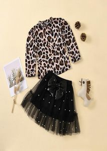 Autunno Bambini Set di abbigliamento Bambini Leopard stampato Top a maniche lunghe Bowknot Perla Maglia di pizzo Gonna corta 2 pezzi Set Vestito da ragazza M28671616817