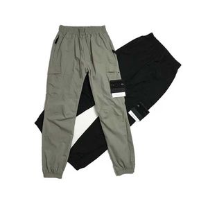 Pantaloni da uomo Abbigliamento firmato Pantaloni di pietra della migliore qualità Pantaloni da uomo Pantaloni da donna Pantaloni cargo causali Capispalla invernale Pantaloni oversize Pantaloni da donna con distintivo Asia S