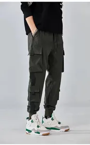 Calças masculinas versão coreana da moda cortada solta e leggings versáteis para trabalho de verão