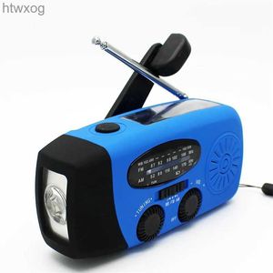 Przenośne głośniki przenośna ładowarka USB na zewnątrz Camping Survival LED LED Ręka Ręka Korba SOS AM FM Radio Solar Speaker YQ240124