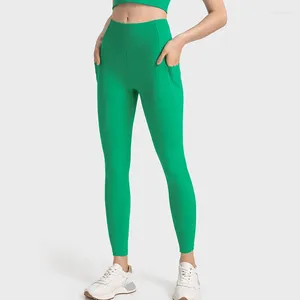 Kvinnors leggings kvinnor 4-vägs sträcka med ficksportig fitness som kör byxor hög midja energi gym flicka