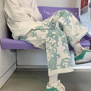 Men's Pants Mid-rise Elastic Waistband Leisure Trousers Drawstring Pockets Men Cartoon Print Straight Wide Leg Streetwear