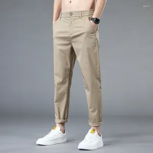 Pantaloni da uomo elasticizzati casual da uomo slim fit pantaloni dritti leggeri pantaloni sportivi estivi ad asciugatura rapida abbottonati kaki solido