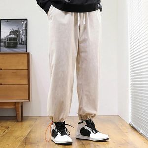 Pantaloni da uomo Pantaloni casual in vita elastica Pantaloni streetwear maschili Tasche con coulisse Pantaloni sportivi solidi Moda larghi lunghi per uomo
