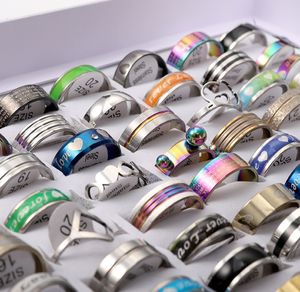 Pierścienie zespołowe pierścienie zespołowe hurtowe bk partie 50pcs Rainbow Kolor stali nierdzewnej cięcie spinner biżuterii moda marka Lot Partia Dostawa 2 otuss