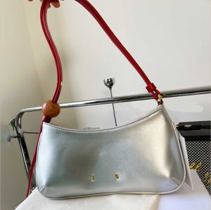 Borse di marca di nicchia francese jaq Borsa con perline Borsa a tracolla singola Designer Hobo Borse Borsa per telefono Borsa per bastone francese Borse per banchetti per le donne