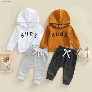 Set di abbigliamento Lioraitiin 0-3 anni Neonato 2 pezzi Completi Lettera maiuscola Stampa Manica lunga Pullover con cappuccio Tasche laterali Pantaloni