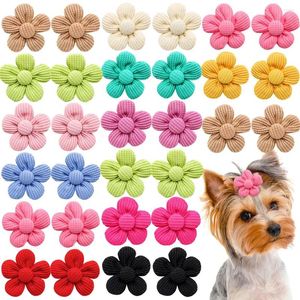 Odzież dla psów 10pcs stały kolor kokardki zwierzaka Puppy Flower Hair gumki dla psów urocze kota w włosach akcesoria