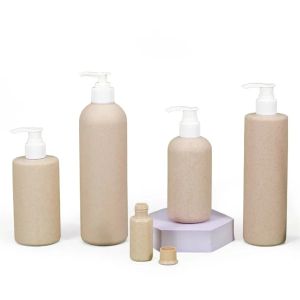 wholesale Bouteilles à pompe en plastique Paille de blé Bouteille PET Recharge Bouteilles de nettoyant pour le visage pour le nettoyage du shampooing essentiel ZZ