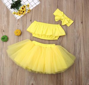 Sommar baby kjol outfit 3pcsset med stort båghårband och rörtopp kortväv kjol barn solid gul färg tjej designer skir7247535