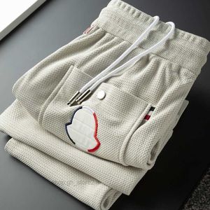 Designer moda roupas mulheres monclair calça outono inverno casual homens calças esportivas cordão corredores sweatpants streetwear asiático tamanho m-5xl eh4n