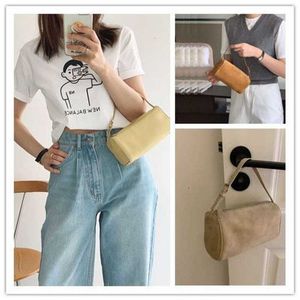 90 -talsdesigner Radhandväskan Bucket Bags Summer Mini Suede Penholder Bag Läder mångsidig underarm