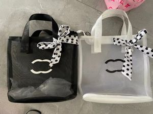 Designer Black White Mesh Shoulder Bag women fashion Shopping Bag Classic Letter Transparent Wash Bag Ribbon decoration Beach Portable00