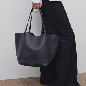 Kvinnors koppling handväska parkväskor luxurys axel shopping hink väska designer mens tyg läder stor kapacitet strand medium crossbody