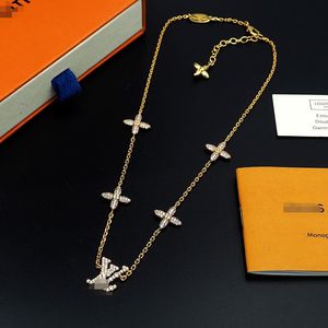 Monogramikonisk Tresor Chain -halsbandsdesigner