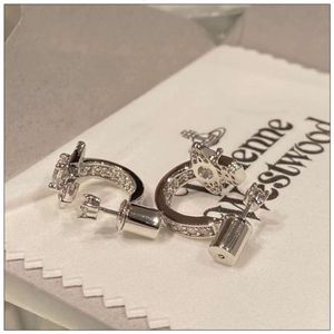 Designer Viviane Westwood Empress Dowager Silver Saturn Crystal Half Ring Orecchini aperti Orecchini alla moda