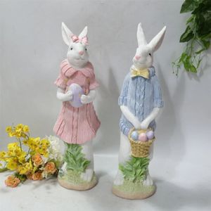 1pcs Easter Bunny Figurine Ornament Resin Standing Rabbit Animals Statue With Easter Egg Basket For Easter Party Home Decor 240119
