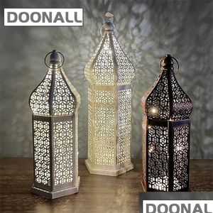 Dekorative Objekte Figuren Hohle Retro-Laterne Marokkanische Boho Hohlgeschnitzte kabellose tragbare Schreibtischlampe Romantischer Metallkäfig Atmo Dhonh