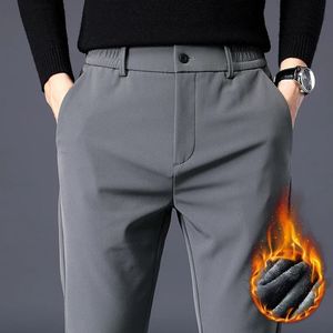 Autumn Winter Pants Män förtjockar fleece fodrad varm elastisk midja utomhus Sweatpants mode Slim Gray Suit byxor Male 240122