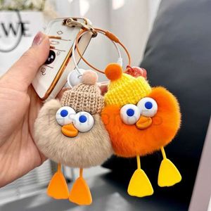 Nyckelringar Lanyards Designer Real Rabbit Päls Ball Keychain Soft Päls Boll Lovely Gold Metal Key Chains Ball Pom Poms Plush Car Keyring Bag Earrings Accessories