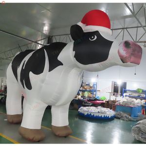 Utomhusaktiviteter 10 ml (33ft) med fläkt Röd hatt Uppblåsbar mjölkko Modell 3D Uppblåsbar djurtecknad film till salu