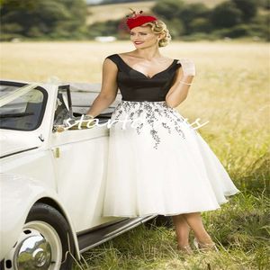 Retro 1950 -talets gotiska svarta bröllopsklänningar 2024 En linje te längd boho brud klänning applique spets kort strand bohemisk brudklänning sexig backless gatsby keltisk mariage