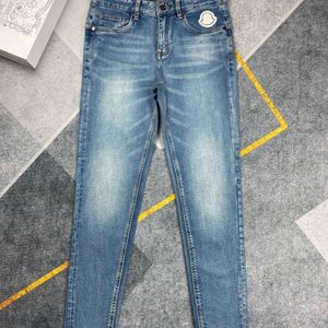 Mode män jeans designer mens kvinnor färgglada tandborste bokstäver broderade grafiska byxor avslappnad lös fast färg rak panna