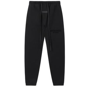 Essentialspants flocking brev byxor män kvinnor hip hop streetwear svettbyxor hög kvalitet frerry dragsko mode gummied etikett casual byxa sammety byxor