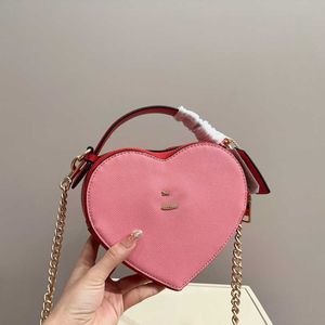 Borsa a cuore Borse da sera di lusso di alta qualità Borsa a cuore Borse a tracolla in pelle di design Borse da donna Mini Crossbody Love Bag Zipper 240129