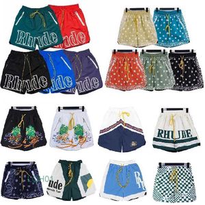 남자 반바지 디자이너 반바지 Rhude Summer Fashion Beach Pants 남자 고품질 거리 착용 레드 블루 블랙 보라색 남성 짧은 미국 siize s-xl nocu