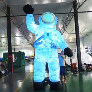 Atividades ao ar livre 10mH (33 pés) Com soprador astronauta inflável gigante com luz led Grande publicidade astronauta Cartoon para venda