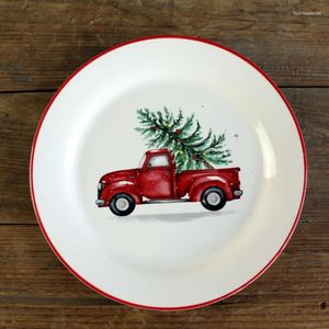 Plattor julgran bilplatta hushåll rätter matar västerländska dekorativa utsökta tekoppar.