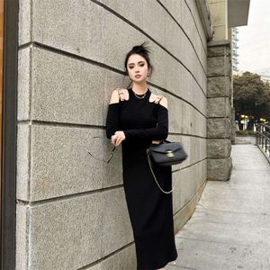 Women's Urban Sexy Dress designer long skirt spring black leaky shoulder neck hanging strap fashionable American modern knitted thread cotton metal chain belt