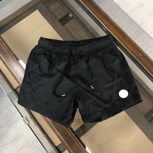 Kort kvinna mens simma korta designer shorts enkel linsficka kort avslappnad färgade strand shorts simning shorts utomhus jogging avslappnad snabb torkning cp kort för människa