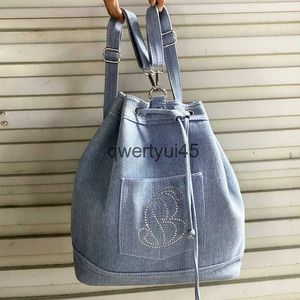 Zaino Zaino stile preppy per donna 2023 Nuovo designer di lusso e borsa Borsa denim Grande capacità Mosaico Imitazione diamante Soulderqwertyui45