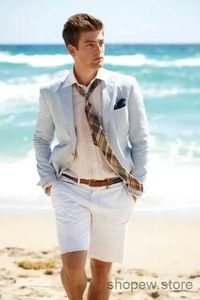 Abiti da uomo Blazer Abiti da uomo in lino blu con pantaloni corti 2 pezzi (giacca + pantaloni + cravatta) Blazer da spiaggia estivo Smoking da uomo personalizzato Abbigliamento da festa di nozze