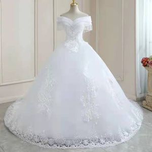 Bescheidene schulterfreie A-Linie Brautkleider, Brautkleider, elegante Kristalle, Quasten, Prinzessin, Spitze, applizierte Pailletten, Plus Size Robe De Mariee, maßgeschneidertes Hochzeitskleid aus Spitze