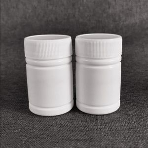 Gratis frakt 100 st 30 ml 30cc 30g HDPE Vit tomt farmaceutisk plastmedicinsk pillerflaskor med mössor aluminiumtätare qvwuw