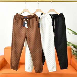 Casual mens sweatpants hip hop mulheres impressas carta masculino solto luxo confortável all-match waffle moda rua design conforto corredores encadernação