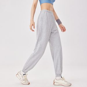 al 2024 pantaloni sportivi per il tempo libero primavera/estate cravatta piedi tinta unita pantaloni da Yoga da corsa pantaloni Fitness vestiti da Yoga per le donne